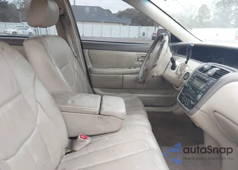 2003 Toyota Avalon Xl z USA, uszkodzony, nr VIN 4T1BF28B93U308673